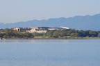 The Lake Biwa Museum and the Karasuma Peninsula, in the south basin of Lake Biwa, viewed from the water. The museum opened in 1996 and over 10 million people have since visited. Lake Biwa is one of the world's few ancient lakes, with a history stretching back four million years. (28 October 2013)