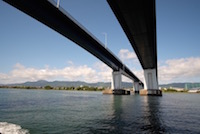 The Biwako Ohashi toll bridges, viewed from the water. The first bridge was opened in September 1964, and the second in July 1994 to accommodate increases in traffic. They currently carry about 35,000 vehicles a day. (27 August 2015)